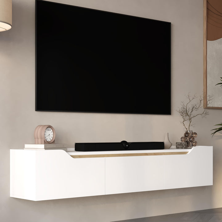 White entertainment console with a TV above it in a modern living room.
